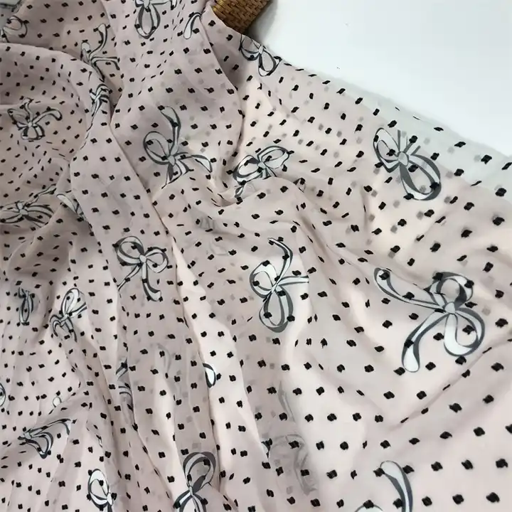 Spring and summer new girl bow printed fabric 100% polyester fabric woven jacquard chiffon black dot fabric