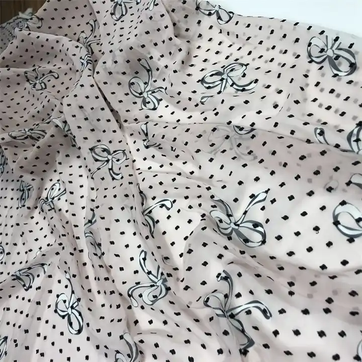 Spring and summer new girl bow printed fabric 100% polyester fabric woven jacquard chiffon black dot fabric