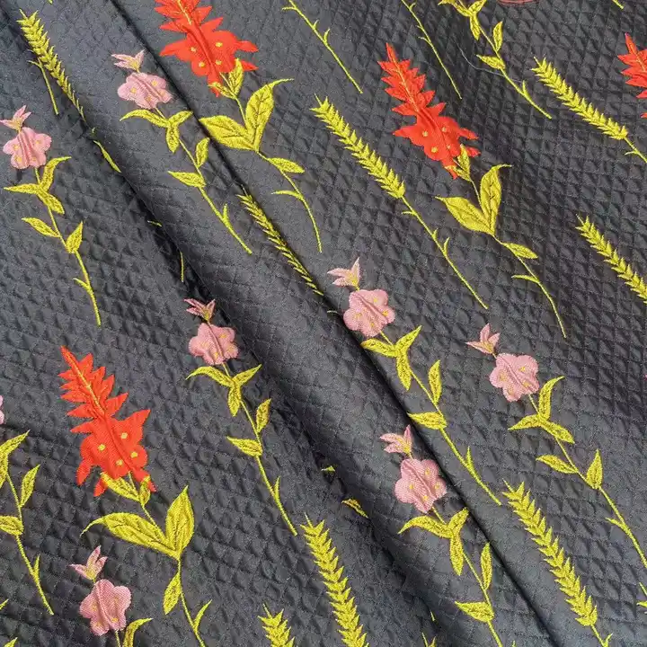 Factory direct sale stock fashion black embossed crepe jacquard flowers brocade fabric for spring and autumn women garments