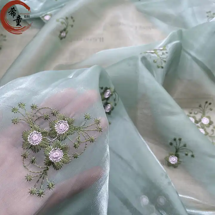 High quality soft handfeeling embroidery flower pattern breathable transparent organza fabric