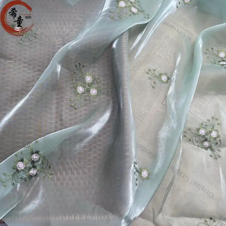 High quality soft handfeeling embroidery flower pattern breathable transparent organza fabric